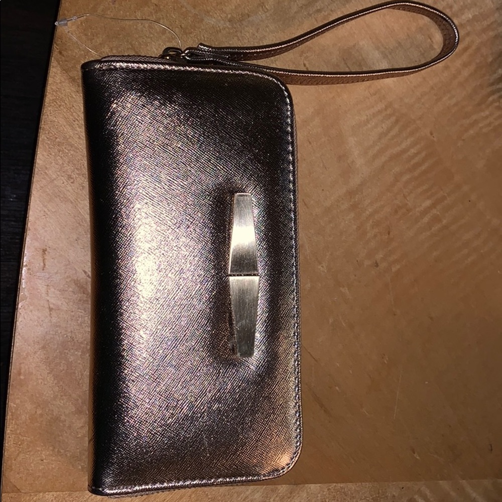 authentic rosegold safiano leather wristletwallet
